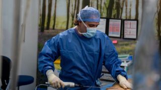 Dr Cotrufo performing surgery, known as the top BBL surgeon in London 